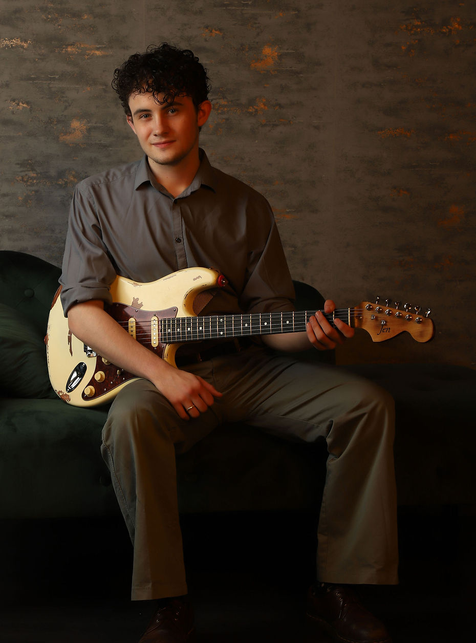 Harvey portrait with guitar